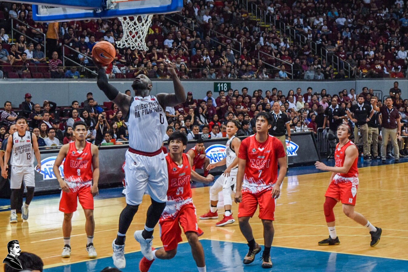 Maroon transfer Bright Akhuetie debuts in fantastic form in UP's season opening game against the UE Red Warriors. Photo Kezhia Maglasang.